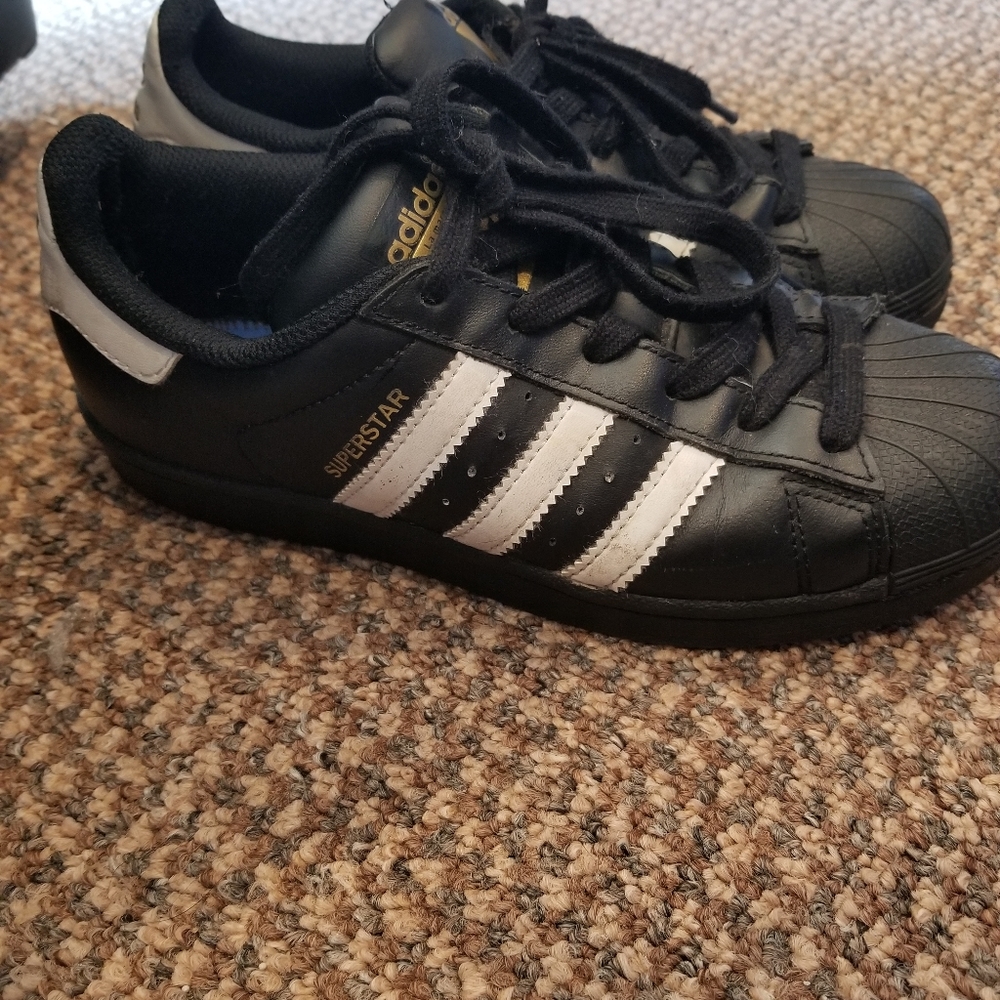 Boys size 4 Adidas shoes also fit size 6 women
